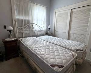 Twin adjustable beds.  Can be used as twins or pushed together for full/queen size.  Uses twin XL sheet or you can fit a deep pocket queen if they are pushed together.