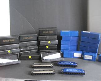 New never used Harmonicas in carry cases
