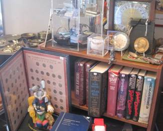 Coins books complete with coins...Books too