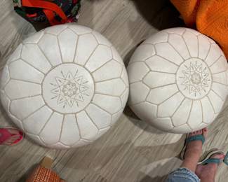 Pair John Derian leather ottomans