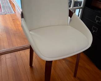 Set of four brand new swivel dining chairs