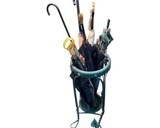 Umbrella stand full of vintage umbrellas