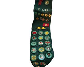 Vintage Girl Scout sash with badges and pens