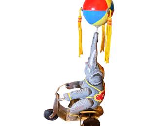 VINTAGE WIND UP TIN ELEPHANT ON A BIKE w/Spinning Ball on Trunk