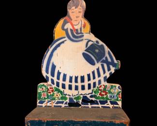 Antique wooden doorstop hand painted