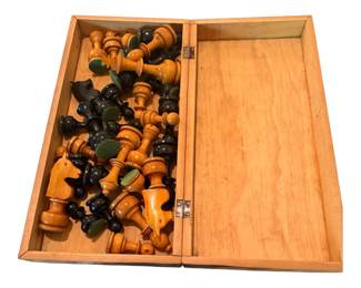 Vintage wooden chess set with folding board
