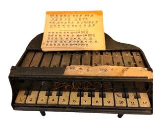 ANTIQUE SUPERTONE TOY PIANO BY LOUIS MARX AND CO.