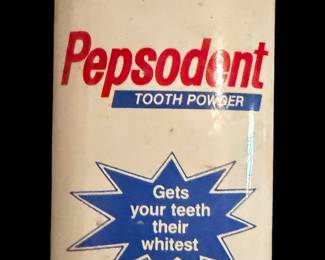 vintage 4 oz. metal tin of Pepsodent Tooth Powder featuring a white body, red brand lettering, and a blue starburst logo with the phrase "Gets your teeth their whitest