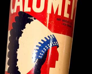 vintage 1-pound Calumet Double-Acting Baking Powder tin from the mid-20th century, featuring the classic red-and-white design and Native American chief logo