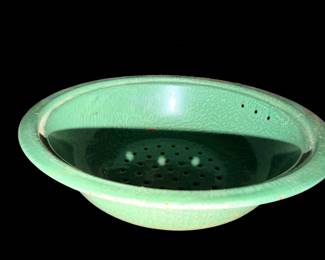 Green and enamelware colander
