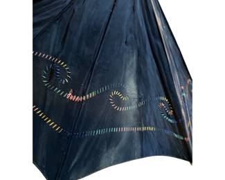 This is a beautiful vintage hand, stitched umbrella with a Bakelite handle
