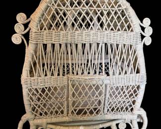 Vintage white wicker birdcage
