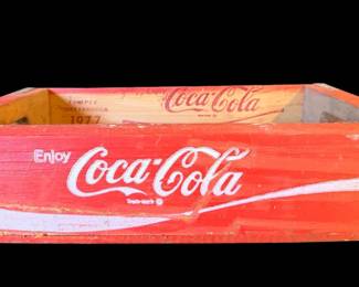 Several vintage coke and Pepsi wooden crates