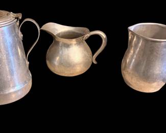 Vintage child’s percolator and pitchers.