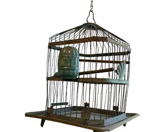 A collection of vintage birdcages