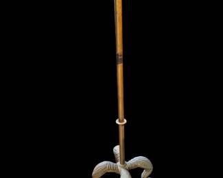 This is a beautiful metal base and rod that go to a mannequin. It would make a beautiful lamp stand.