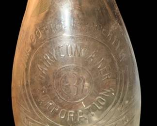 vintage embossed glass milk bottle from the Dairy Container Corporation in Detroit, Michigan