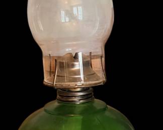 A GREEN GLASS OMBRE GLASS OIL LAMP