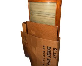 These are very hard to find in this condition. This is an oak bowfront China cabinet door. With curved Glass.