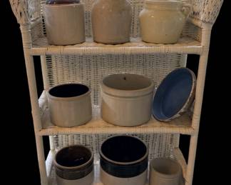 Vintage wicker shelf, and some of the many crocks offered