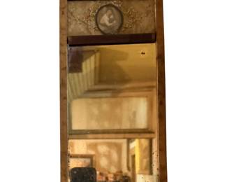 Antique mirror with mother and child portrait