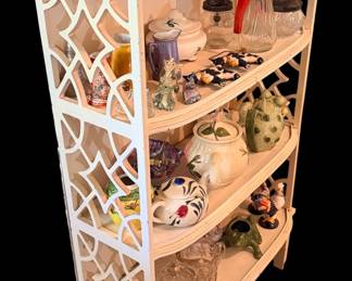 Pretty little vintage shelf full of a collection of salt and pepper peppers