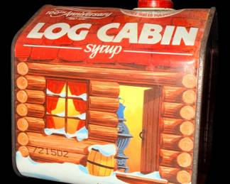 a 1987 Log Cabin Syrup 100th Anniversary Collectible Tin issued by General Foods