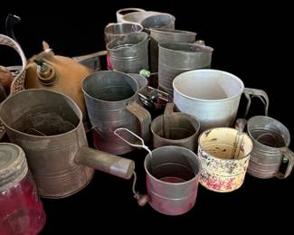 A collection of vintage sifters