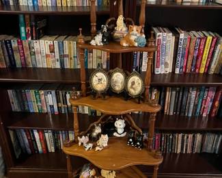 nice corner cabinet, lots of books and shelves