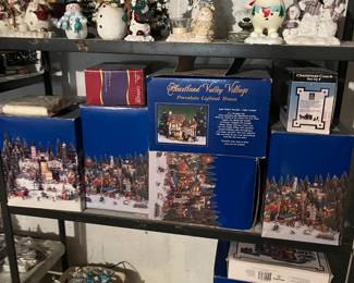 christmas village houses and stores, still in boxes