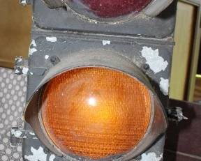 Vintage amber/yellow/green traffic signal lens manufactured by the Eagle Signal Corporation