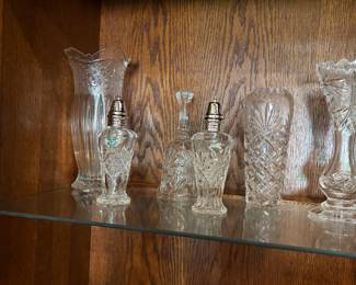 Salt and pepper shakers. Crystal dinner bell, and clear crystal vases