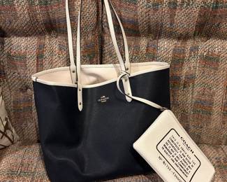 Brand new COACH bag. Black outside and cru inside