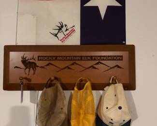 Hats, elks hat rack and weathered texas flag
