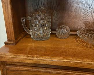 Notice te white ceramic knobs on the hutch