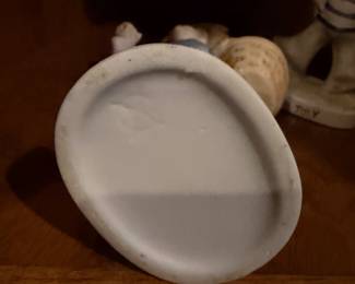 Very faint inscribed marking on this figurine