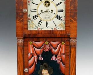 A 19th century Hotchkiss & Benedict shelf clock. 8-day weight driven time and strike Brass movement marked No. 2671 and dated 1836 with painted wood dial and floral detail, Roman numerals, subsidiary seconds and "Flying Eagle" pendulum bob, dial marked "Warranted by Hotchkiss & Benedict". Mahogany case with a shaped crest above a square dial door and lower door with reverse painted portrait glass flanked by flat pilasters with carved capitols on a simple plinth base. Interior paper label 80% intact. Older refinishing with minor wear, some loss and touch-ups to lower door glass, replaced weights and pendulum bob, running when cataloged. 37 1/4" high overall. ESTIMATE $400-600