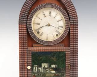 A 19th century J. C. Brown ripple front shelf clock. 8-day Brass time and strike movement with papered metal dial. Rosewood Round Gothic or "Beehive" style case with applied ripple molding, single door with circular upper glass and reverse painted lower. Paper label inside back 80% intact. Old finish with wear and minor damage, wear to lower glass, re-papered dial, running when cataloged. 18 3/4" high. ESTIMATE $300-500