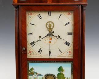 An early 19th century Eli Terry Pillar and Scroll shelf clock with outside escapement. 30-hr weight driven time and strike wooden plate movement with painted wooden dial and Arabic numerals. Mahogany case with scrolled swan neck crest and brass finials above a single door with square dial glass and reverse painted lower with gilded detail, flanked by delicate turned columns on a molded base with scrolled cutout and tall tapering feet. Paper label 30% intact. Older refinishing with good color, minor dial wear, older replaced wooden finials, weight holes drilled in bottom board, running when cataloged. 29" high overall. ESTIMATE $2,000-3,000