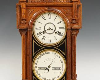A late 19th century Waterbury No. 43 Model shelf clock.  8-day time and strike movement with lower calendar mechanism and apertures indicating day and month, papered metal dials with Roman/Arabic numerals.  Oak case with carved detail features a shaped crest above a single door with molded frame and reverse painted glass flanked by reeded columns on a molded base.  Paper labels verso 30% intact.  Refinished with slight wear, dials re-papered, running when cataloged.  28 3/4" high.  ESTIMATE $200-300