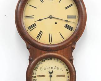 A late 19th century Seth Thomas Office Calendar No. 4 model wall clock.  8-day time and strike movement and lower calendar mechanism with apertures indicating day and month, painted metal dials with Roman/Arabic numerals.  Rosewood case with a single door, two circular dial glasses and applied decoration.  Paper label on door 80% intact.  Older refinishing with some wear, re-painted dials, running when cataloged.  27 1/2" high.  ESTIMATE $200-300