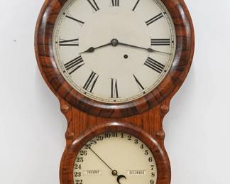 A late 19th century Seth Thomas Office Calendar No. 4 model wall clock.  8-day time and strike movement and lower calendar mechanism with apertures indicating day and month, painted metal dials with Roman/Arabic numerals.  Rosewood case with a single door, two circular dial glasses and applied decoration.  Older refinishing with some wear, re-painted dials, running when cataloged.  27 1/2" high.  ESTIMATE $200-300