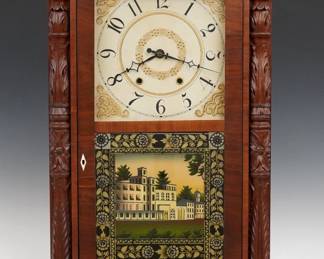An early 19th century Jeromes & Darrow Column & Splat shelf clock. 8-day wooden plate time and strike movement, painted wooden dial with Arabic numerals and scrollwork detail. Mahogany case with a carved Eagle crest over a single door with clear dial glass and reverse painted lower, flanked by carved pilasters on a simple plinth base. Interior paper label varnished over, 50% intact. Refinished with minor wear, restored crest and lower door glass, replaced pulleys, running when cataloged. 35 1/2" high. ESTIMATE $200-300