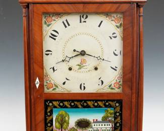 An early 19th century Silas Hoadley Pillar and Scroll shelf clock. 30-hr weight driven time and strike wooden plate movement with painted wooden dial and Arabic numerals. Mahogany case with scrolled swan neck crest and Brass finials above a single door with square dial glass and reverse painted lower with gilded detail, flanked by delicate turned columns on a molded base with scrolled cutout and tall tapering feet. Paper label 80% intact. Older refinishing, some veneer repair, glued repairs to crest, some dial wear, replaced finials, running when cataloged. 30 1/2" high overall. ESTIMATE $400-600