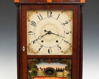 An early 19th century Eli Terry Pillar and Scroll shelf clock. 30-hr weight driven time and strike wooden plate movement with painted wooden dial and Arabic numerals. Mahogany case with scrolled swan neck crest and Brass finials above a single door with square dial glass and reverse painted lower with gilded detail, flanked by delicate turned columns on a molded base with scrolled cutout and tall tapering feet. Paper label 50% intact. Older refinishing with good color, minor dial wear, replaced finials, running when cataloged. 31" high overall. ESTIMATE $600-800