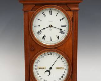 A late 19th century Seth Thomas Parlor Calendar No. 6 model shelf clock.  8-day time and strike movement with lower calendar mechanism, painted metal dials with Roman/Arabic numerals and apertures indicating day and month.  Walnut case with scrolled crest and turned finial over a single door with circular dial glasses on a molded base with cut out skirt.  Paper label on back of door 20% intact.  Older refinishing with minor wear, restored dials on the back of the original, running when cataloged.  20 1/4" high overall.  ESTIMATE $400-600