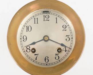 A 20th century Chelsea ships clock.  3 3/4" Silvered dial with Arabic numerals and ships Bell striking, serial #210176.  Brass case with threaded bezel.  Some case wear, minor dial wear, running when cataloged.  ESTIMATE $200-300