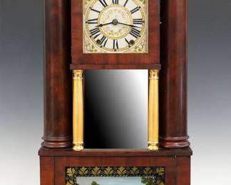 An early 19th century E. & G. W. Bartholomew hollow column shelf clock. 30-hr wooden plate time and strike movement, painted wooden dial with Roman numerals and floral corners. Mahogany case with a gilded Eagle crest above a square dial door and central fixed mirror flanked by turned gilded columns, with two outer full length hollow weight columns over a single door base with reverse painted glass, all supported by carved paw feet. Interior paper label 50% intact. Nicely refinished with minor wear, restored lower door glass, small dial touch-ups, replaced weights, running when cataloged. 35 1/4" high. ESTIMATE $600-800
