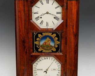 A late 19th century Seth Thomas Parlor Calendar model shelf clock.  8-day weight driven time and strike Lyre movement with lower calendar mechanism, painted metal dials with Roman/Arabic numerals and apertures indicating day and month.  Rosewood case with a molded crown over a single door with octagonal dial glasses and reverse painted center glass flanked by chamfered pilasters on a conforming molded base.  Paper label inside backboard 10% intact.  Nicely refinished with minor wear, restored dials, running when cataloged.  30 1/2" high overall.  ESTIMATE $800-1.200