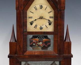 A mid 19th century Elisha Manross Steeple on Steeple shelf clock.  8-day time and strike Strap Brass Fusee movement with painted metal dial and Roman numerals.  Rosewood case with cone shaped finials, upper door with shaped dial glass and reverse painted lower glass, lower door with reverse painted glass.  Lacks paper label inside.  Older refinishing with some wear, dial wear and flaking, running when cataloged.  23 1/2" high.  ESTIMATE $300-400